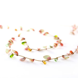 Collier très féminin à porter devant ou dans le dos